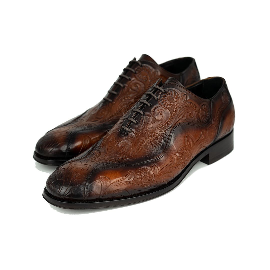 AARON PIEL CINCELADA